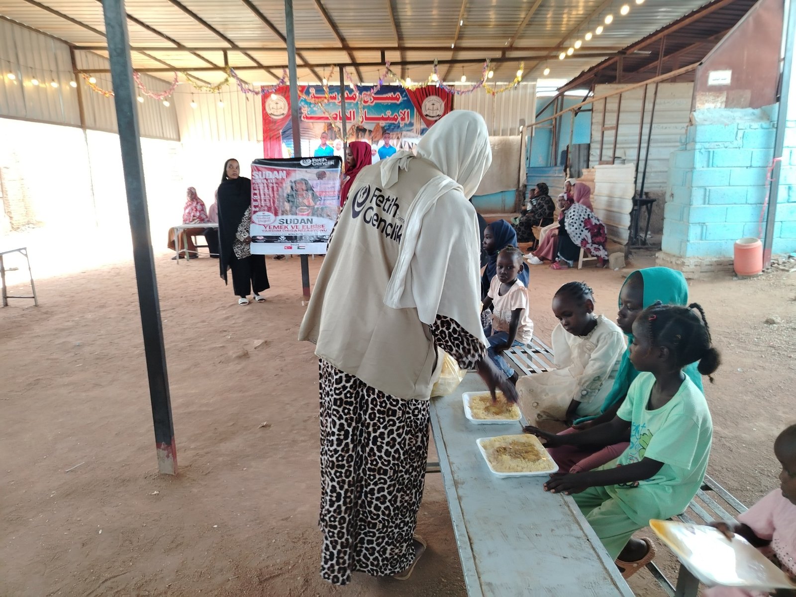 مشروع حفل الكسوة والإطعام لأبناء الشهداء والمفقودين وأمهاتهم 2 - توثيق 27