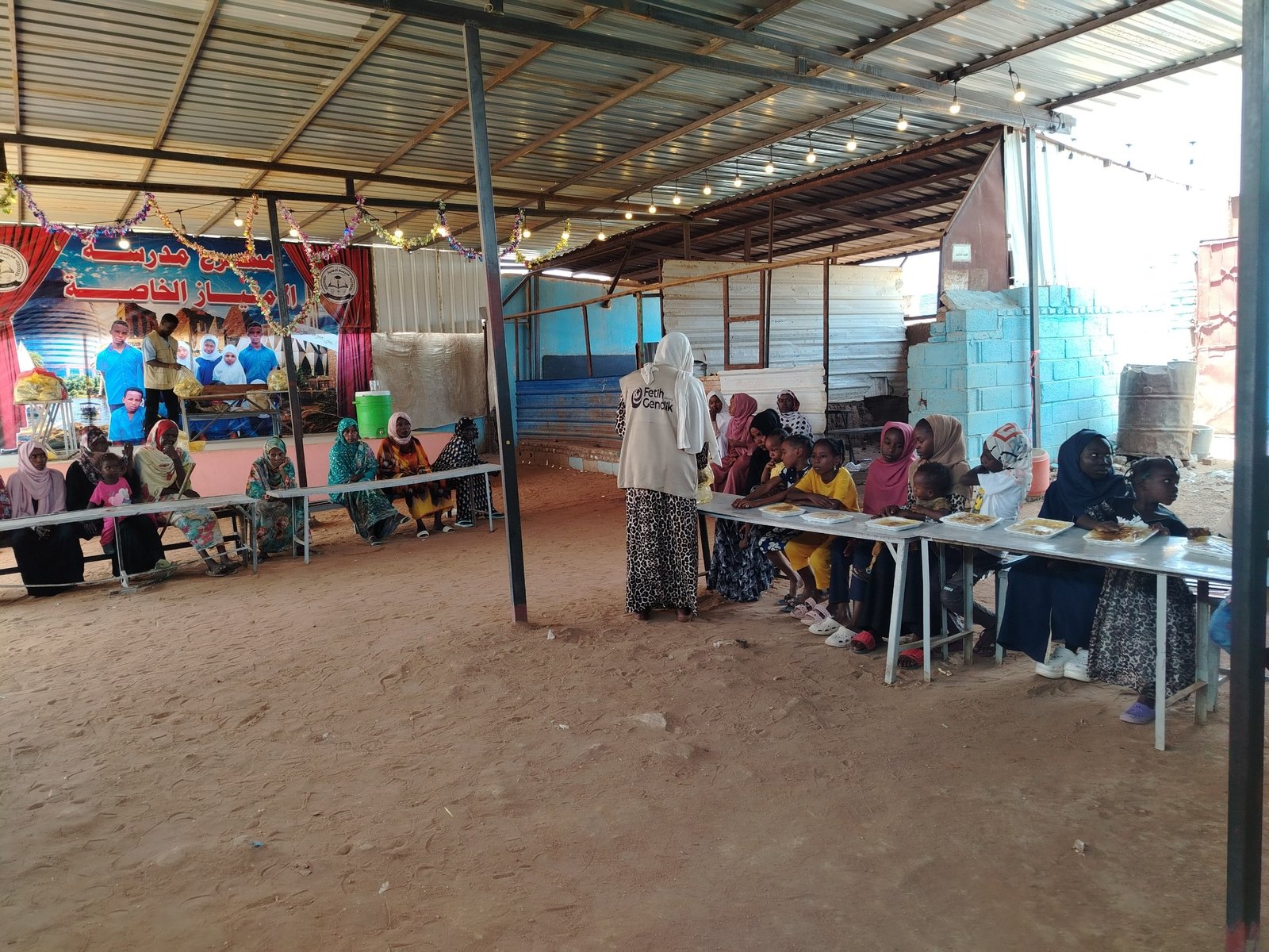 مشروع حفل الكسوة والإطعام لأبناء الشهداء والمفقودين وأمهاتهم 2 - توثيق 14